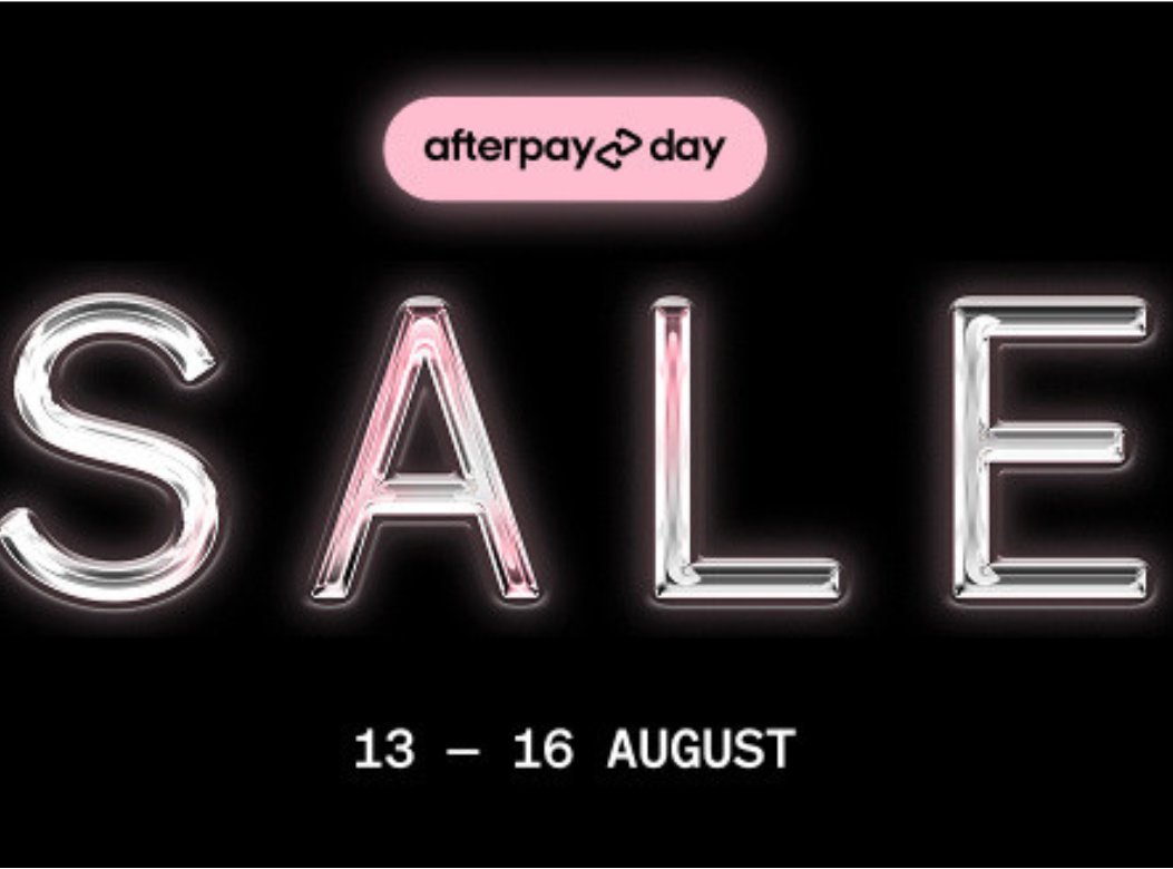 Promotional sale graphic on a black background with a pink 'afterpay day' badge at the top and large metallic-style 'SALE' text. Smaller white text at the bottom reads '13 - 16 AUGUST'.
